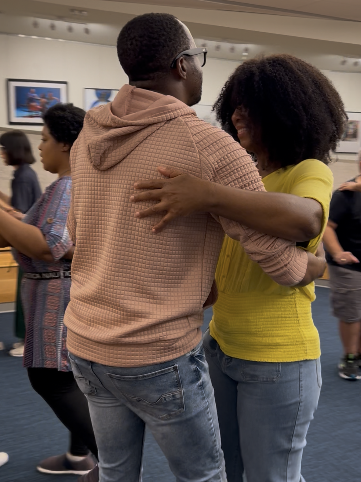 Home Image of two blind dancers in close embrace dancing Kizomba